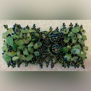 Handcrafted bracelet, chunky green beads with multi colored beads.